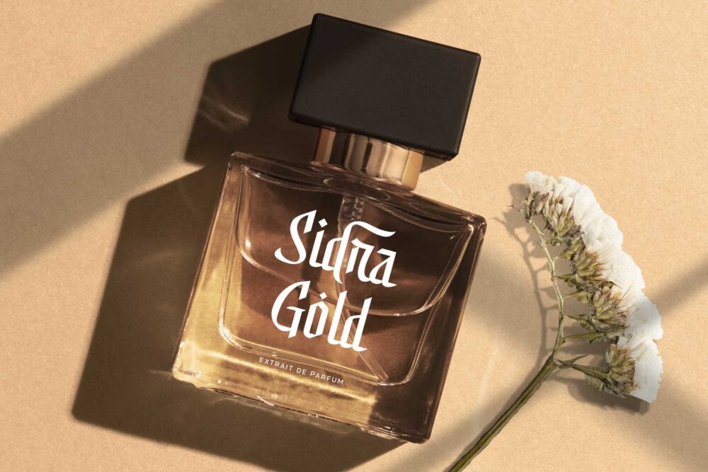 Elegant Arabic-inspired display font named Shamirah featuring sharp details, graceful curves, and luxury branding applications on architecture, perfume packaging, food branding, and editorial designs.