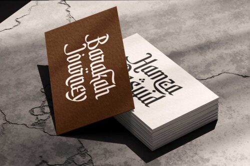 Elegant Arabic-inspired display font named Shamirah featuring sharp details, graceful curves, and luxury branding applications on architecture, perfume packaging, food branding, and editorial designs.